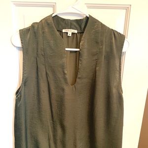 Green sleeveless blouse